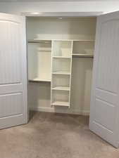 View of primary bedroom closet