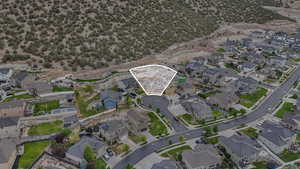 Aerial overview of property's location featuring nearby suburban area