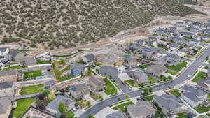 Aerial overview of property's location with nearby suburban area