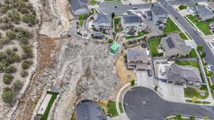 Aerial view of property's location featuring nearby suburban area