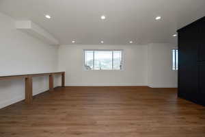 Spare room featuring recessed lighting and light wood-type flooring