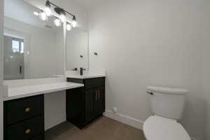 Bathroom featuring vanity and light tile patterned flooring