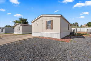 View of property exterior featuring driveway