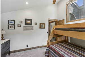 Bedroom with carpet and baseboards