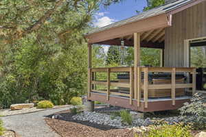 View of home's community with a wooden deck
