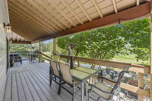 Wooden terrace with outdoor dining area