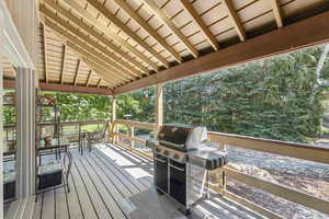 Deck featuring area for grilling