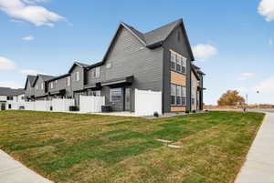 View of side of home featuring a residential view