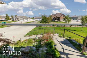 View of yard featuring a residential view and a mountain view
