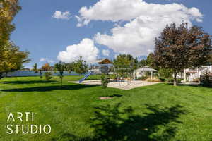 Community play area featuring a gazebo and a patio