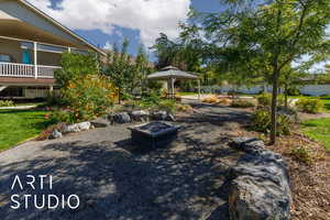 View of patio / terrace featuring an outdoor fire pit