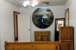 Bedroom featuring a ceiling fan