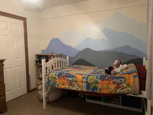 Bedroom featuring carpet flooring