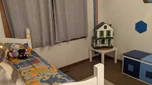 Bedroom with baseboards