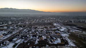 Aerial view at dusk of a mountain view and a residential view