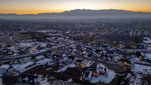 Aerial view at dusk of a mountain view and a residential view