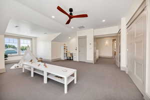 Game room with recessed lighting, light carpet, ceiling fan, lofted ceiling, and a desk
