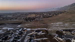 Aerial view at dusk of a residential view and a mountain view