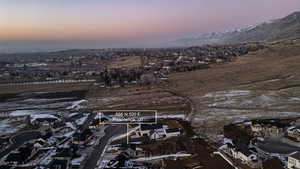 Aerial view at dusk of a residential view and a mountain view