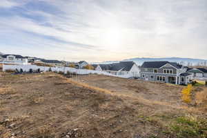 Rear view of property featuring a residential view