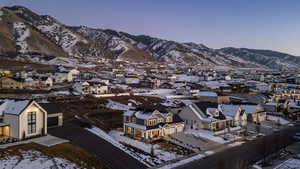 View of mountain background featuring nearby suburban area