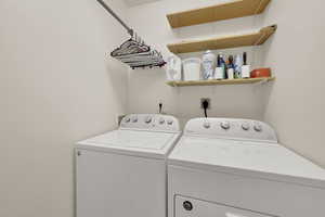 Laundry area with separate washer and dryer