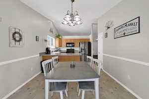 Dining space with a chandelier