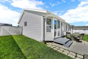 View of home's exterior featuring a patio area