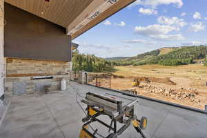 View of patio with a mountain view