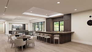 Bar area with recessed lighting and dark brown cabinetry