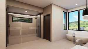 Bathroom with a stall shower, a freestanding tub, plenty of natural light, tile walls, and elevator