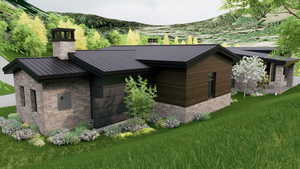 Rear view of property featuring stone siding, a chimney, a lawn, and a standing seam roof