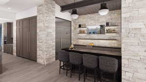 Indoor bar featuring decorative columns, decorative light fixtures, light wood finished floors, modern cabinets, and open shelves