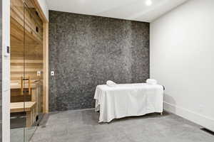 Bedroom with a sauna / steam room and recessed lighting