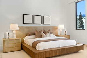 Bedroom featuring baseboards