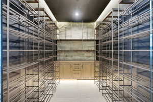 Wine area featuring light floors