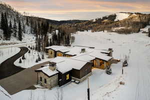 Snowy aerial view with a mountain view