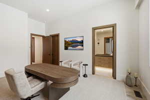 Home office with baseboards and recessed lighting