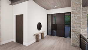 Interior space featuring light wood-style floors, wooden ceiling, and recessed lighting