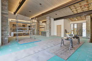 Misc room featuring beamed ceiling