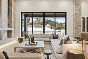 Living area featuring a mountain view and plenty of natural light