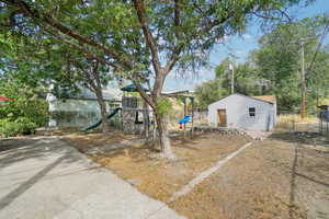 View of yard featuring a playground