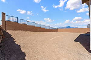 View of fenced backyard