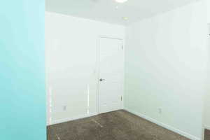Bedroom 2 with carpet & baseboards