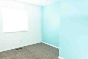 Carpeted bedroom 2 with baseboards