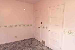 Bedroom, carpet and baseboards