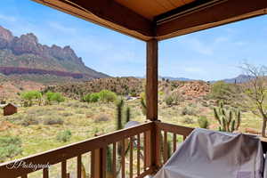 Balcony with a grill and a mountain view