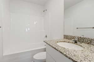 Full bathroom with vanity and shower / bath combination