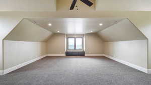 Bonus room with carpet flooring, recessed lighting, lofted ceiling, and ceiling fan