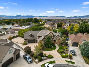 Aerial perspective of suburban area with a mountain backdrop